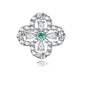 Sterling silver adjustable ring featuring four-leaf clover design with green center moissanite and clear accent stones