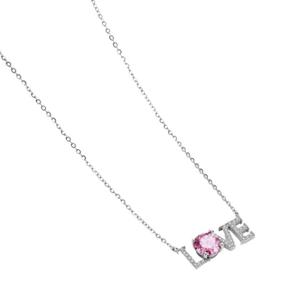 Sterling silver LOVE necklace with pink moissanite stone replacing the O, featuring crystal-set letters on delicate chain.