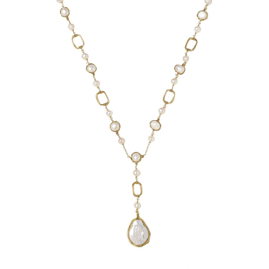 Long gold-plated necklace with alternating freshwater pearls and crystal bezels, featuring a large baroque pearl pendant