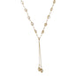 Adjustable gold lariat necklace with freshwater pearls nested in delicate cage settings and Y-shaped tassel drop