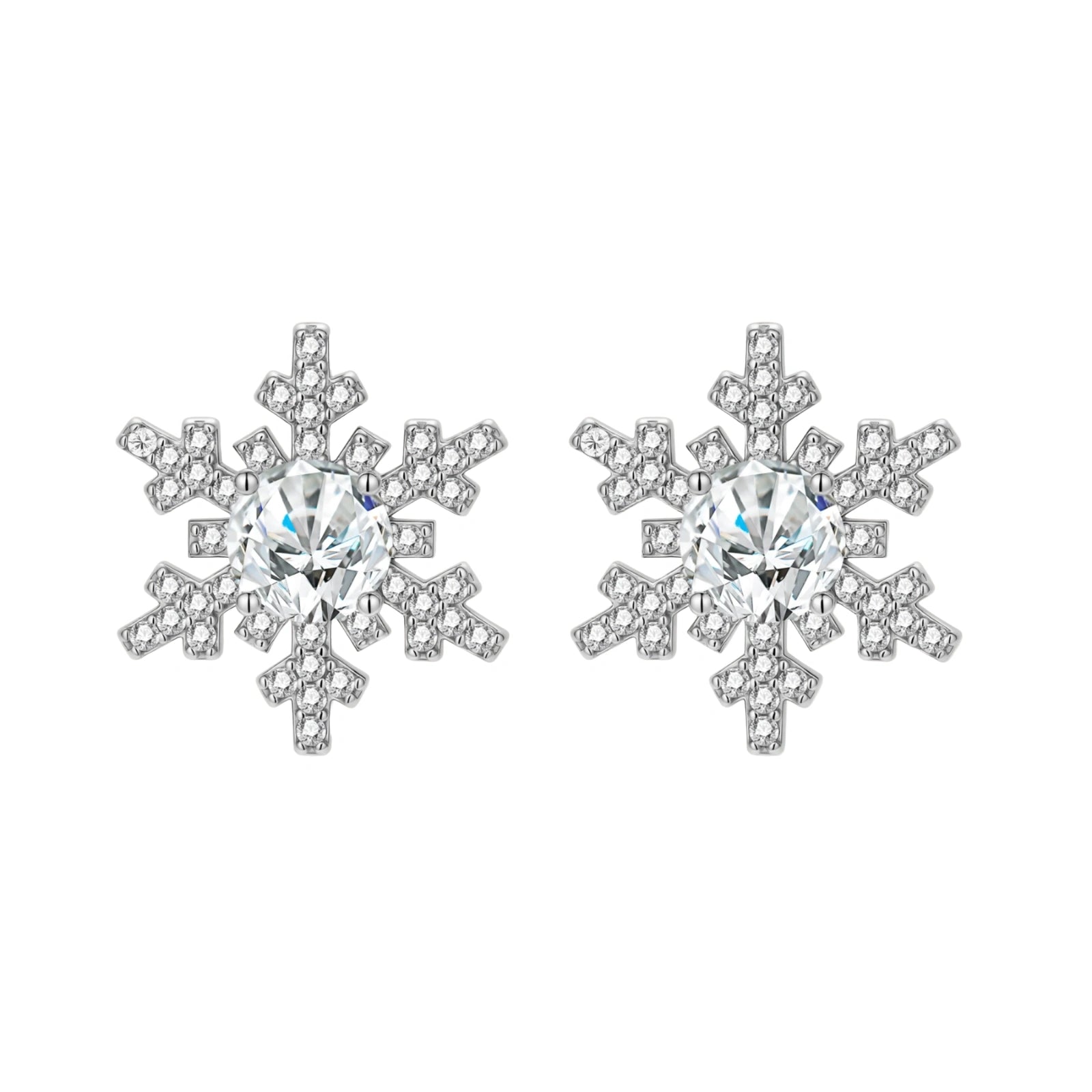 Sterling silver snowflake stud earrings with brilliant moissanite centers and intricate geometric patterns on cream background