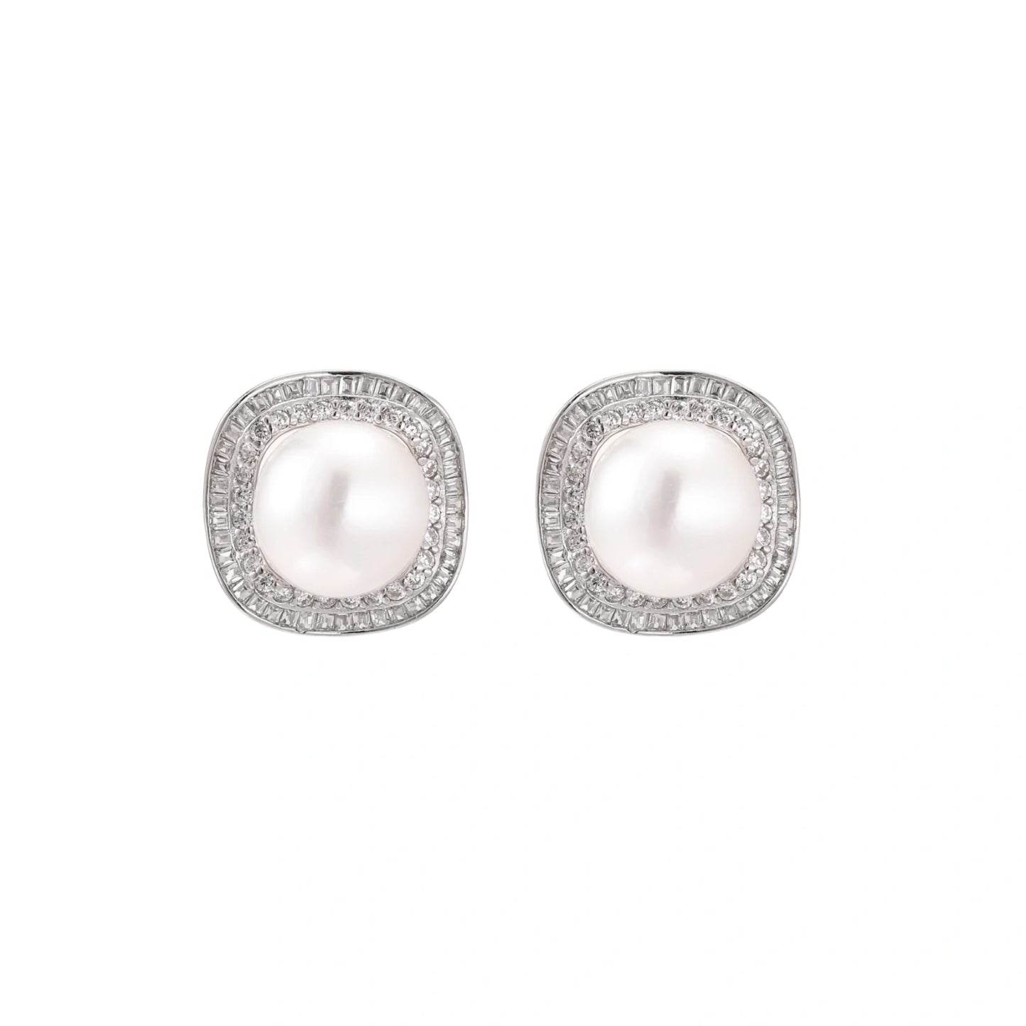 Rhodium-plated sterling silver stud earrings with round freshwater pearls surrounded by geometric crystal halos on cream background.