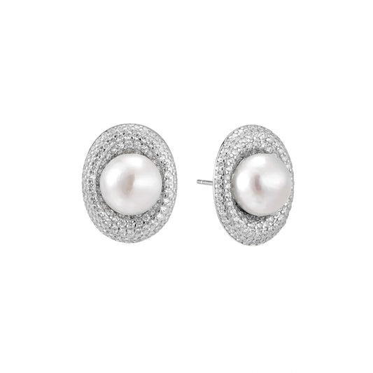 Elegant stud earrings with cream freshwater pearls surrounded by sparkly pavé crystals on rhodium-plated silver setting