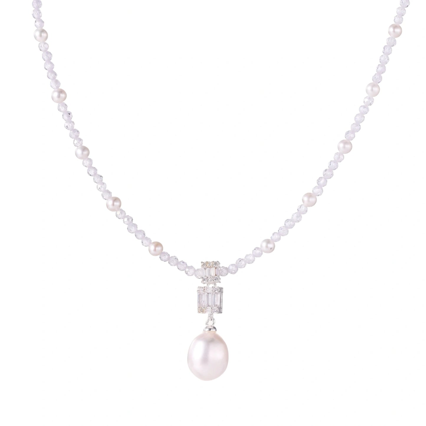 Dainty necklace with lavender crystal beads, freshwater pearls, geometric pendant, and large pearl drop on white background.