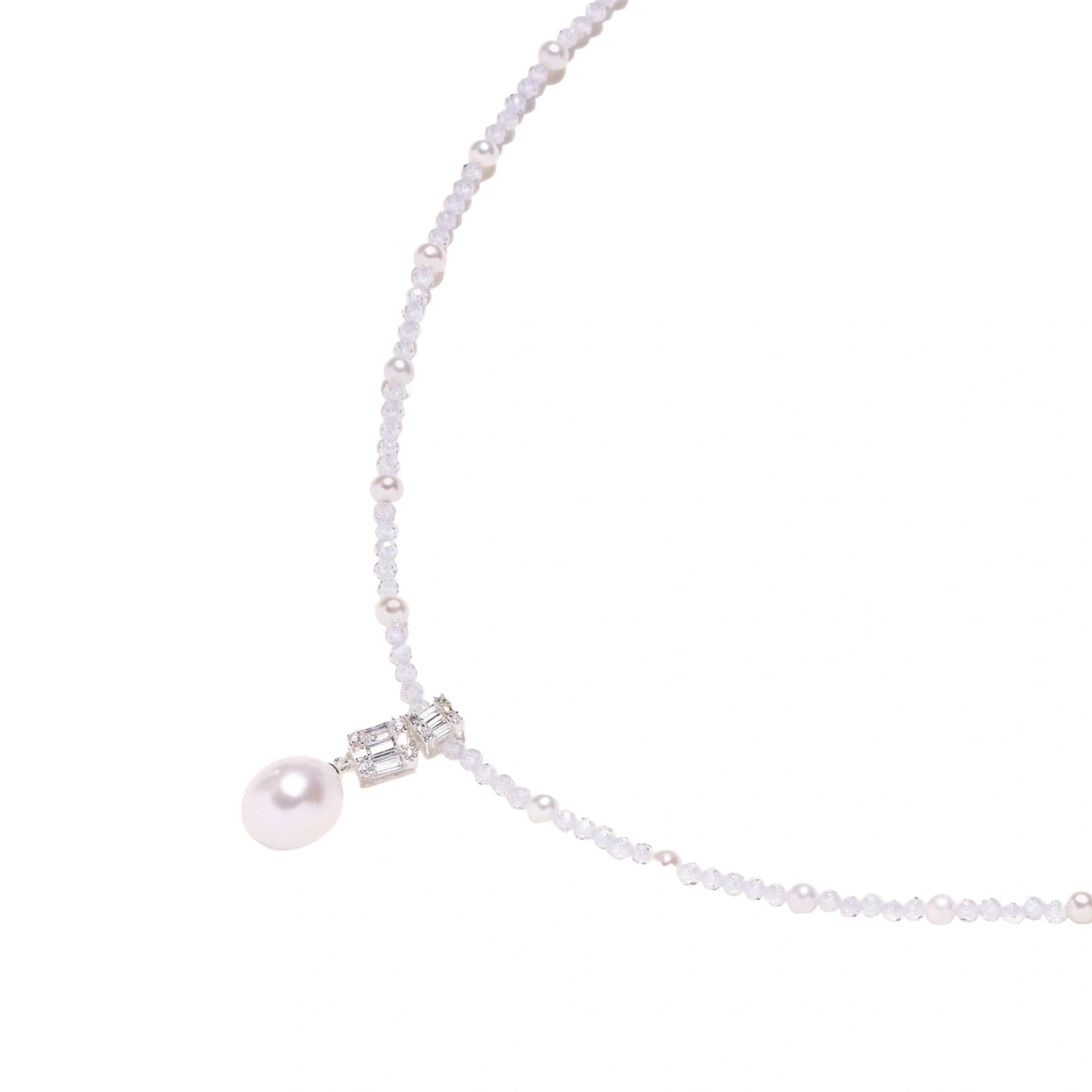 Dainty necklace with lavender crystal beads, freshwater pearls, geometric pendant, and large pearl drop on white background.