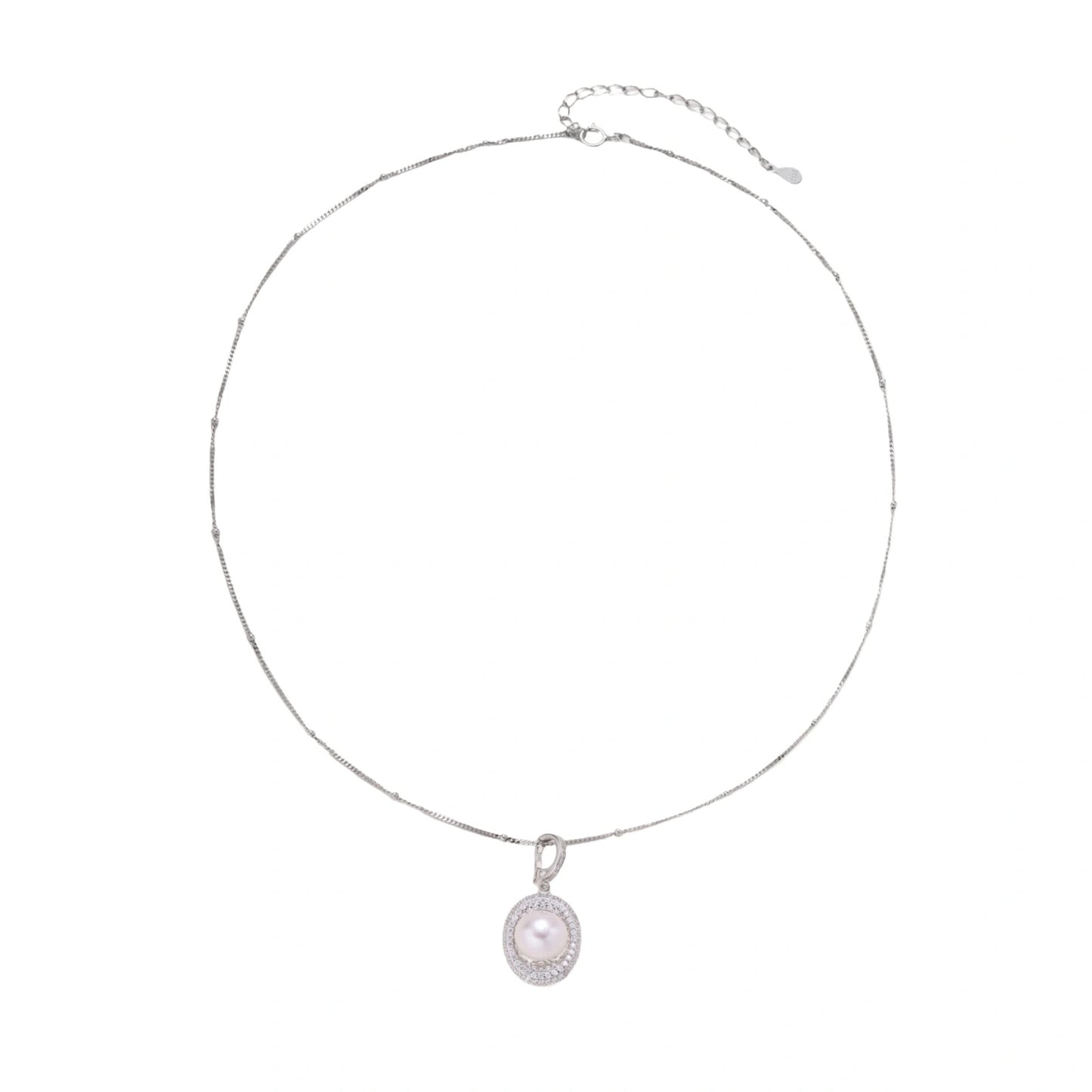 Oval sterling silver pendant with crystal halo surrounding a white freshwater pearl on delicate chain