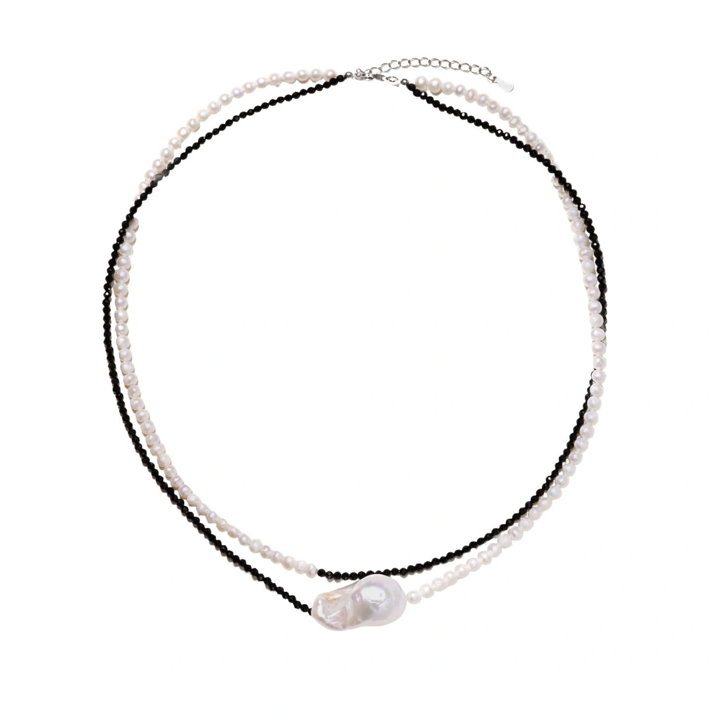 Double-strand necklace with black faceted quartz and white pearls featuring an oversized baroque pearl centerpiece