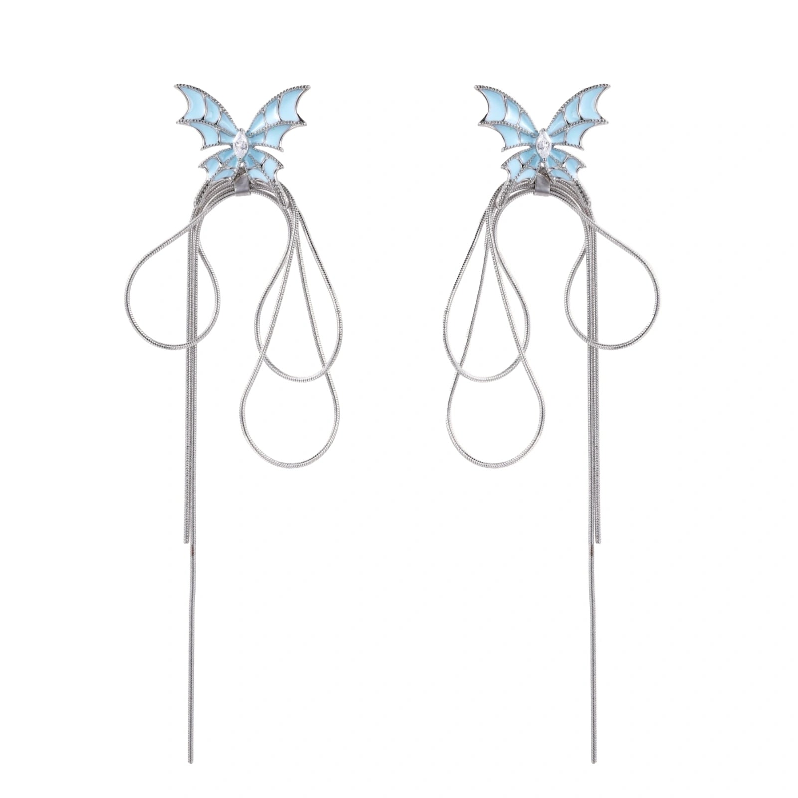 Long silver-tone earrings with powder blue enamel butterfly studs and flowing chain tassels on cream background