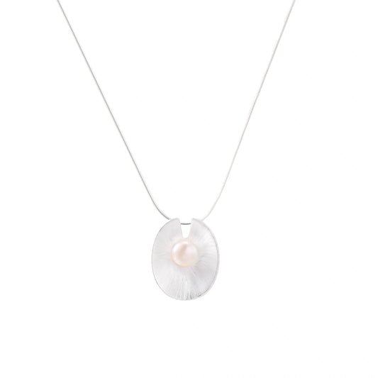 Sterling silver disc necklace with textured finish and centered freshwater pearl on delicate chain