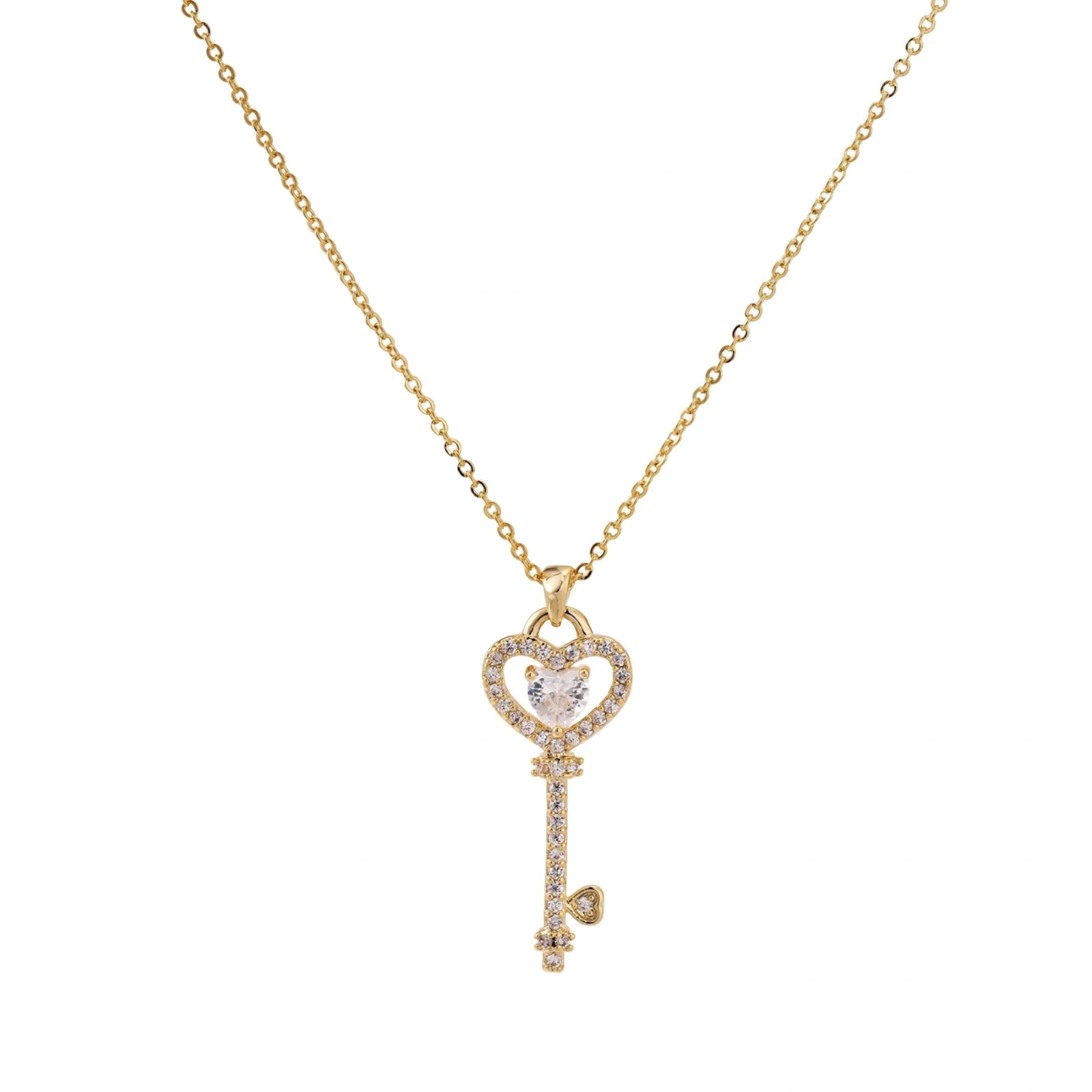 Delicate gold key pendant with heart-shaped bow and crystal pavé detailing on fine chain against cream background.