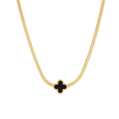 Dainty 18K gold-plated herringbone chain necklace with black enamel quatrefoil clover pendant on white background