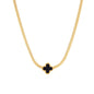 Dainty 18K gold-plated herringbone chain necklace with black enamel quatrefoil clover pendant on white background